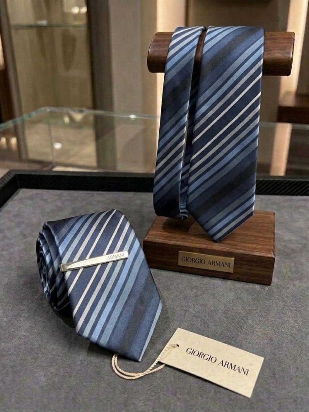 This item is a Giorgio Armani diagonal striped necktie
